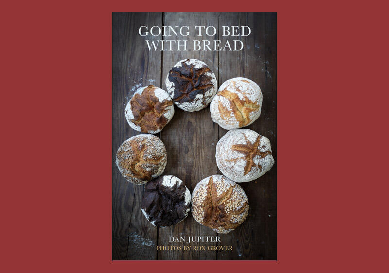 book cover image featuring seven round loaves of bread in a circle