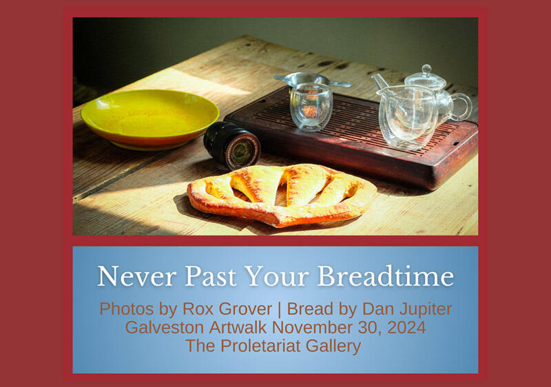 a still life photo of specialized bread and a tea set with a camera lens